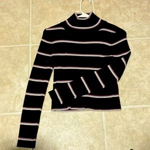 It’s a black striped crop top size medium the brand is pink republic